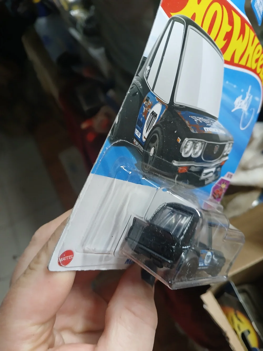 Hot Wheels Tooned Mazda RX-3 in black, featuring the 